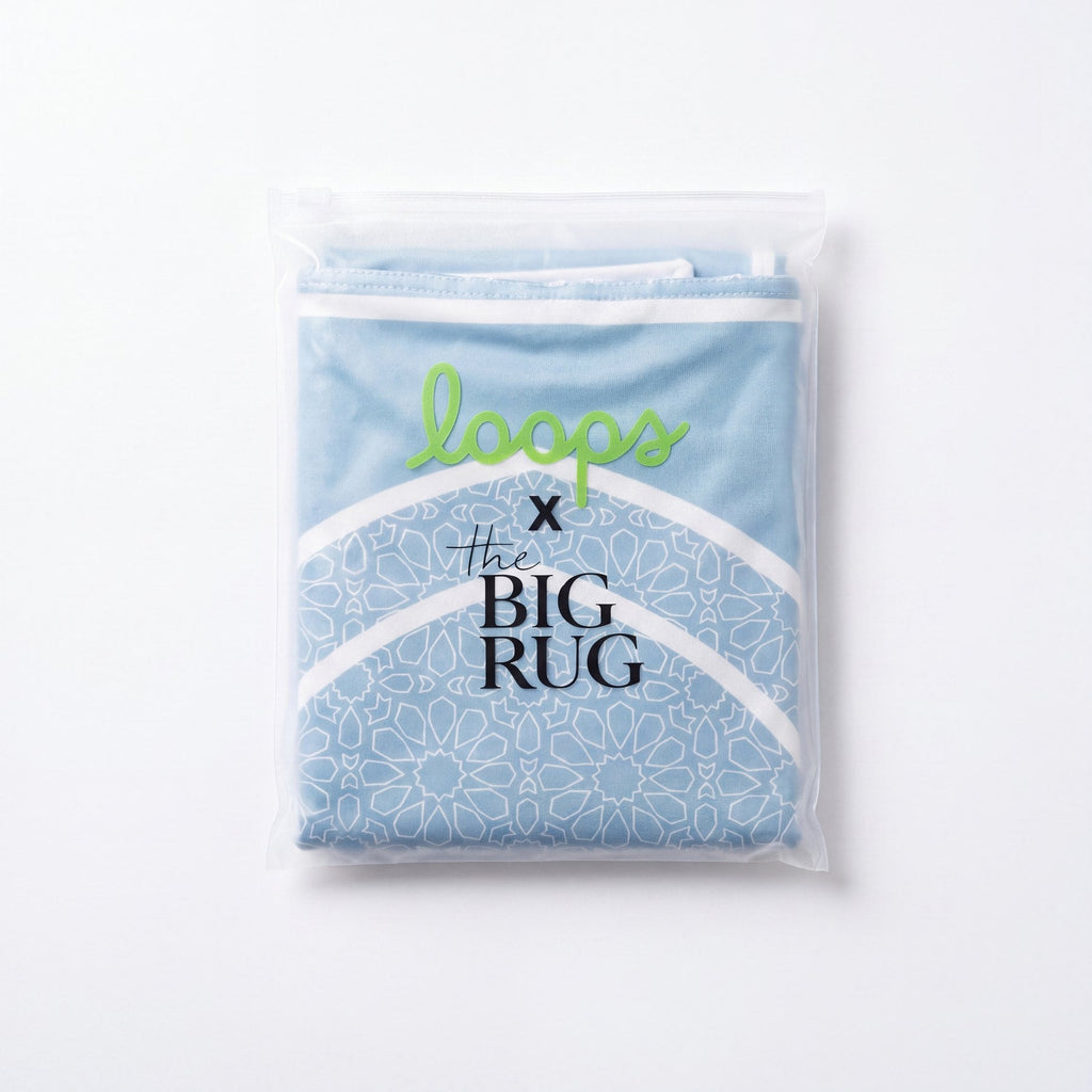 Loops x The Big Rug in Blue in its resealable pouch